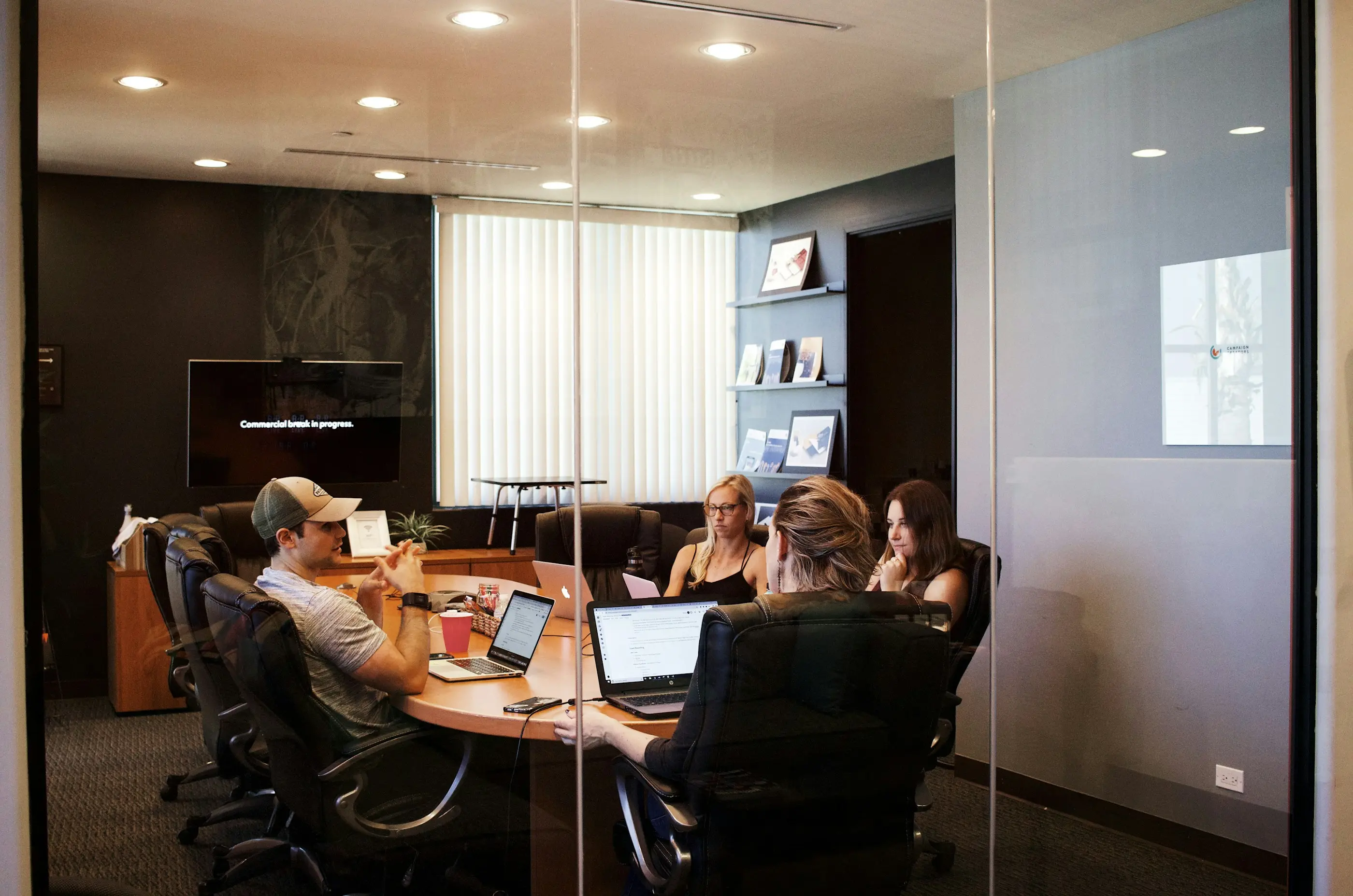 Software accounting team reviewing finance operations together